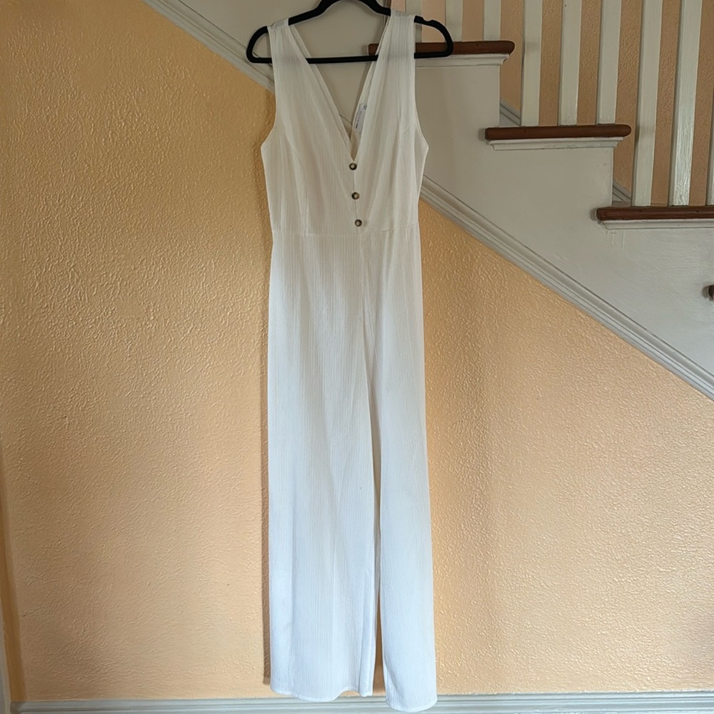 Sleeveless white jumpsuit
